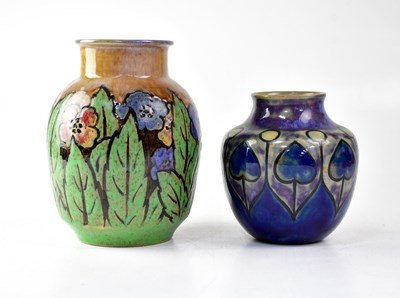 Lot 296 - ROYAL DOULTON; a stoneware vase decorated with...