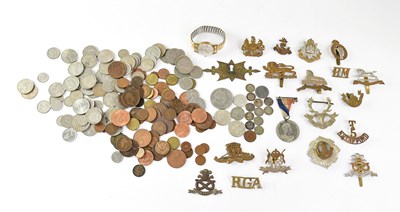 Lot 414 - A collection of assorted military cap badges,...