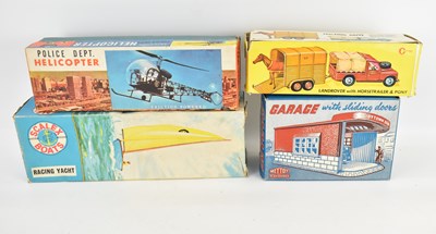 Lot 880 - A boxed Mettoy Playthings garage with sliding...