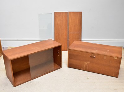 Lot 2048 - STAPLES; a teak Ladderax system, with two...