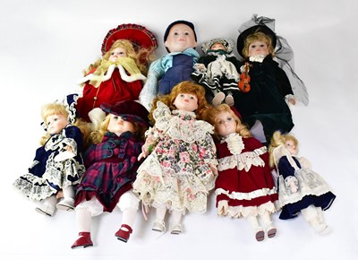 Lot 741 - A group of porcelain collectors' dolls, to...