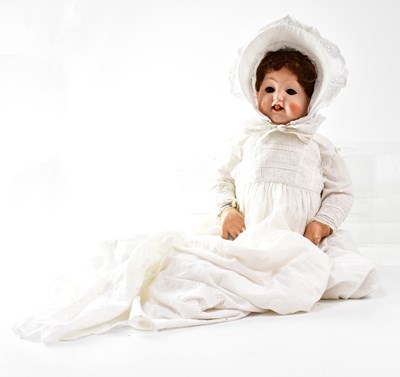 Lot 718 - A bisque head doll with open eyes and mouth,...