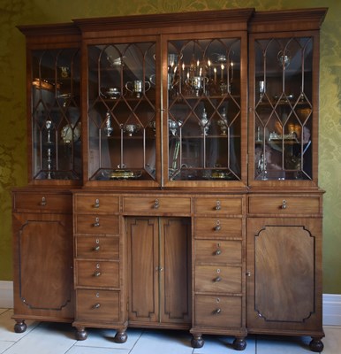 Lot 1553 - A Regency mahogany breakfront bookcase