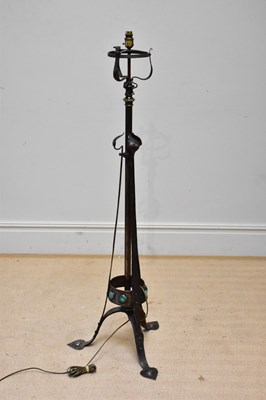 Lot 2047 - An Arts & Crafts hammered metal telescopic...