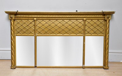 Lot 1018 - A large Regency gilt wood overmantel mirror...