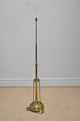 Lot 2044 - An Arts & Crafts brass standard lamp.