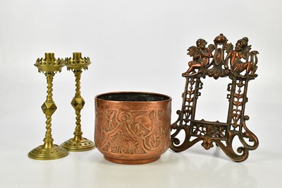 Lot 1734 - A pair of Victorian Gothic brass candlesticks...