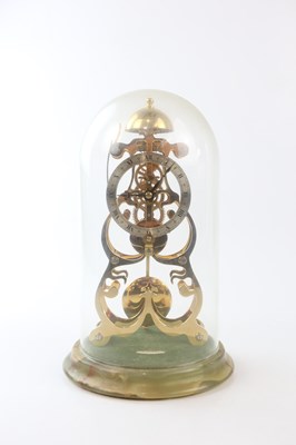 Lot 1438 - THWAITES & REED; a modern brass skeleton clock,...
