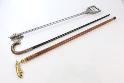 Lot 1584 - A silver mounted ebonized walking cane, the...