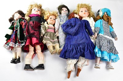 Lot 721 - Seven porcelain collectors' dolls, to include...