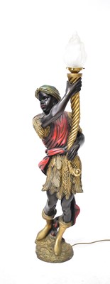 Lot 95 - A large floor standing composite Blackamoor...