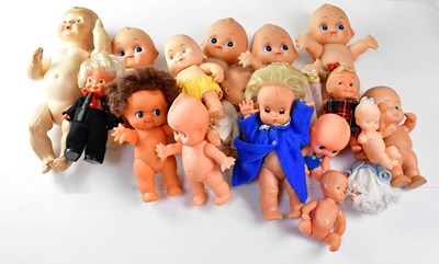 Lot 708 - A group of various vinyl dolls, to include a...