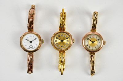 Lot 595 - Three lady's 9ct gold cased wristwatches, with...