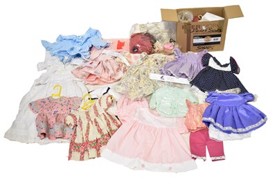 Lot 744 - A large quantity of various dolls' clothing,...