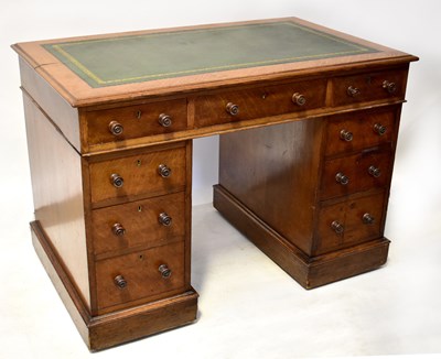 Lot 23 - An early 20th century oak pedestal desk with...