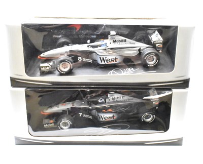 Lot 865 - WEST MCLAREN MERCEDES; two boxed Formula 1...