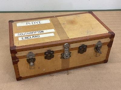 Lot 49 - An early 20th century linen over ply travel...