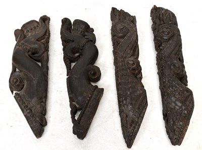 Lot 1517 - Four Anglo-Indian carved wood decorative wall...
