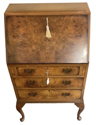 Lot 54 - A 1930s walnut bureau of small proportions,...