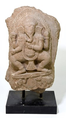Lot 542 - An Indian stone fragment carved with the...