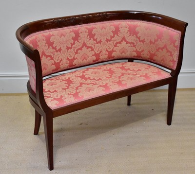 Lot 1036 - An Edwardian style mahogany settee with carved...