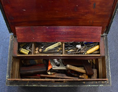 Lot 134 - A large vintage wooden tool chest containing various modern and vintage workshop tools