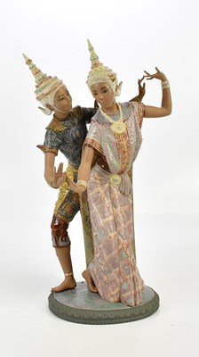 Lot 2517 - LLADRO; a large porcelain figure group of two...