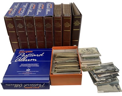 Lot 447 - A large quantity of postcards contained in...