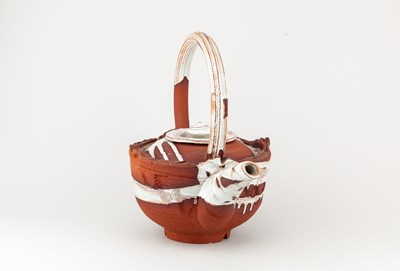 Lot 5 - ADAM TOBIN; a large red stoneware teapot...