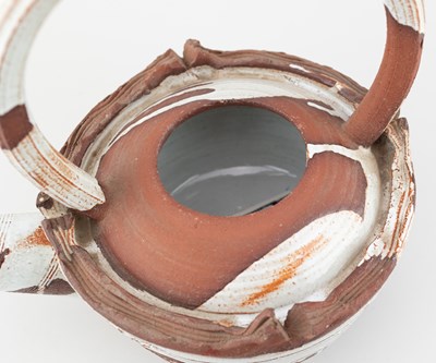 Lot 5 - ADAM TOBIN; a large red stoneware teapot...