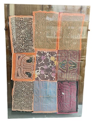Lot 1056 - A large African tapa cloth, in clear acrylic...