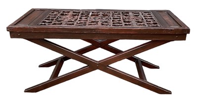 Lot 8 - A heavily carved Chinese panel, mounted on a...