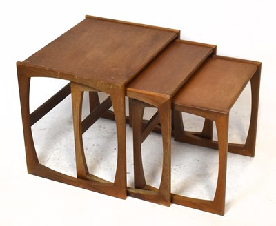 Lot 1716 - A nest of three mid-century teak coffee tables,...