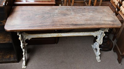 Lot 1420 - A Coalbrookdale style cast iron garden table,...