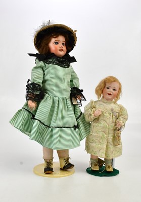 Lot 34 - SFBJ; a French bisque headed doll with...