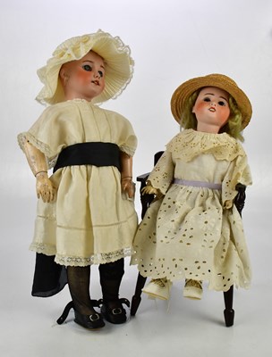 Lot 35 - SFBJ; a French bisque headed doll with glass...