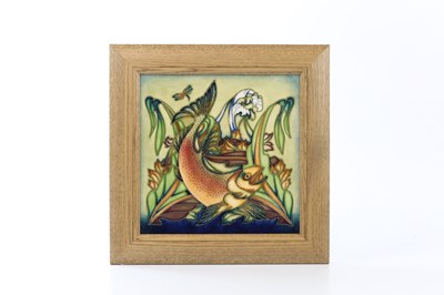Lot 2242 - PHILLIP GIBSON FOR MOORCROFT; a framed tile in...