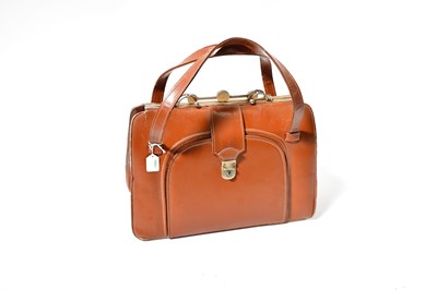 Lot 558 - An Argentinian brown leather vanity travelling...