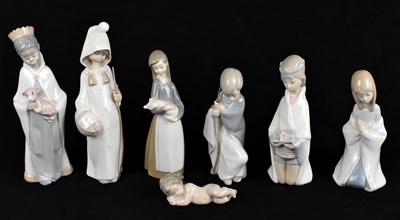 Lot 598 - LLADRO; a collection of seven ceramic figures...