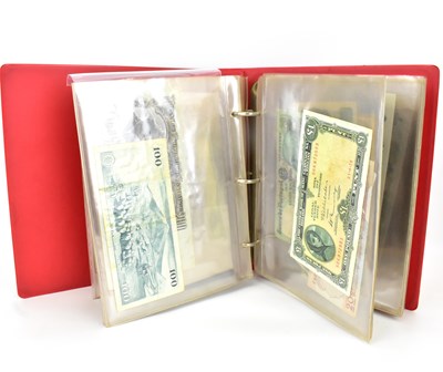 Lot 712 - A folder of approximately forty-six banknotes