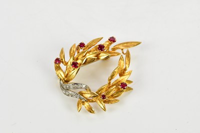 Lot 350 - A yellow metal diamond and ruby set reef...