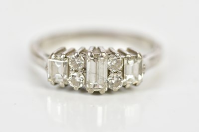 Lot 39 - An 18ct white gold diamond set seven stone...