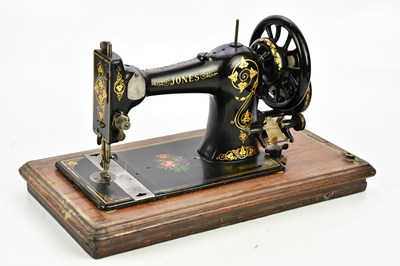 Lot 1679 - JONES C.S. FAMILY; a vintage cast iron sewing...