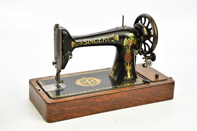 Lot 1681 - THE SINGER MANUFACTURING CO; a vintage cast...