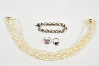 Lot 502 - A triple strand cultured pearl necklace, two...
