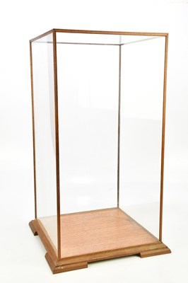 Lot 1535 - An oak framed glass display cabinet on bracket...
