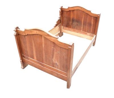 Lot 1353 - A French walnut carved double bed frame,...