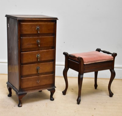 Lot 1352 - An early 20th century oak five drawer chest,...