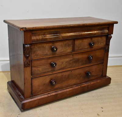 Lot 1295 - A Victorian mahogany chest of drawers with...