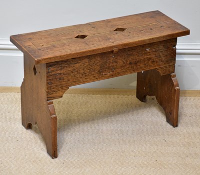 Lot 1296 - A medium oak rectangular stool with lozenge...
